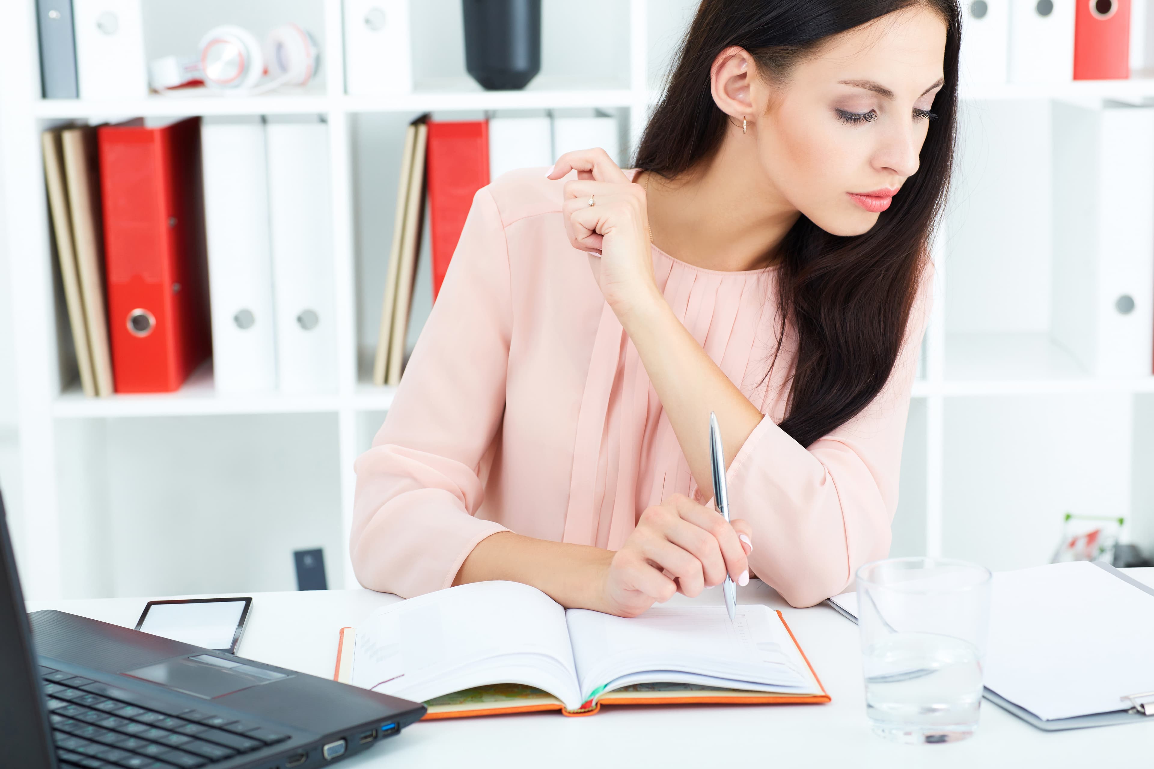 Beautiful young businesswoman working in the office.