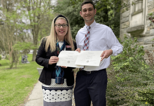 Proud College Grad: Todd Berman with his business professor Christine Hagedorn on the Rosemont College campus.